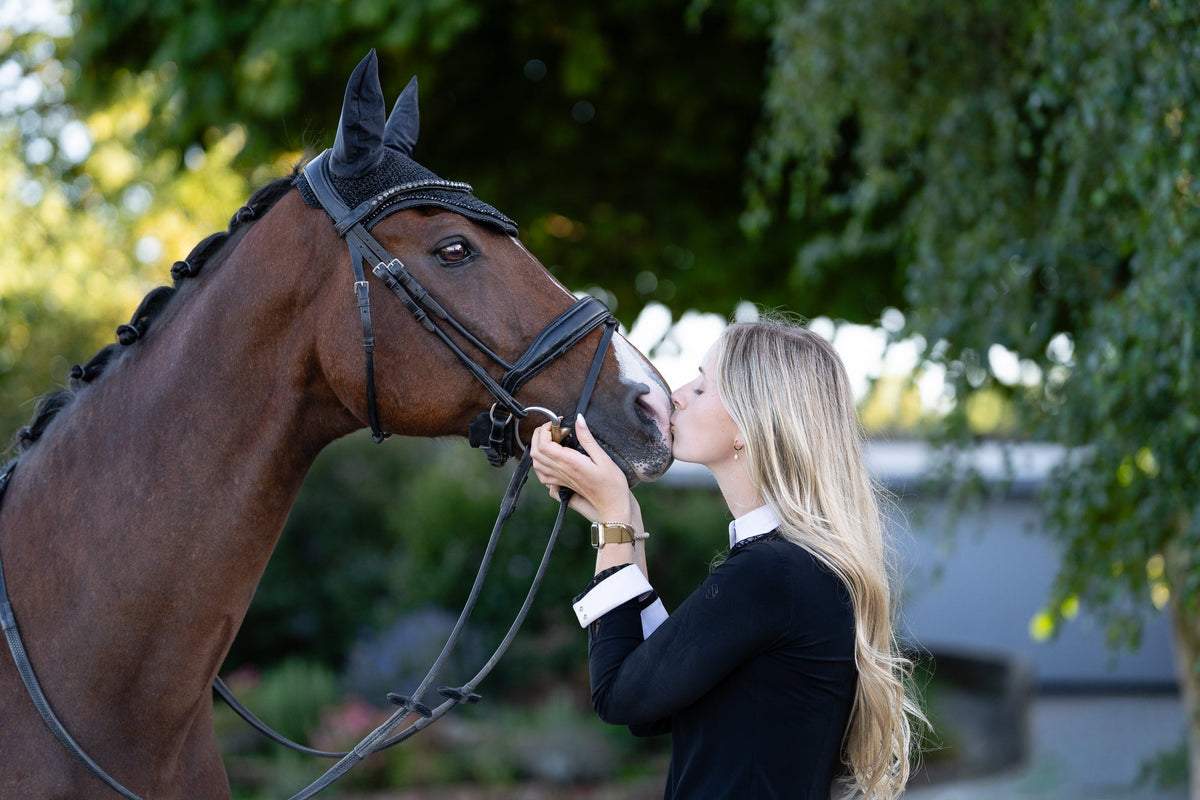 Pferd mit BIBO Pulmifier® und Reiterin